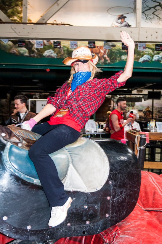 Riding the bull at Stampede is a staple of the Reality Rally obstacles (c) Crispin Courtenay