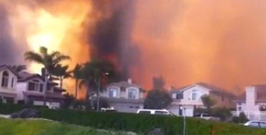 Homes threatened by the Poinsettia Fire in Carlsbad, Calif., May 14, 2014. Screenshot/Facebook